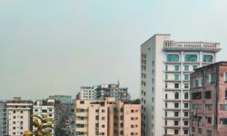 IMF Bangladesh Monetary Policy and inflation outlook illustrated by panoramic Dhaka urban skyline