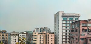 IMF Bangladesh Monetary Policy and inflation outlook illustrated by panoramic Dhaka urban skyline